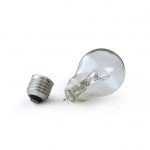 A broken lightbulb on a white background