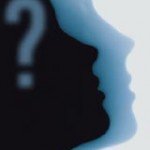 Silhouette of a head duplicating with a question mark for a brain