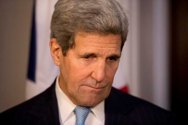 John Kerry with sad look on face