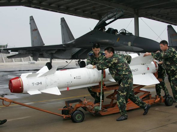 Chinese military push missile at aircraft facility