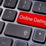 Red button on keyboard reads Online Dating