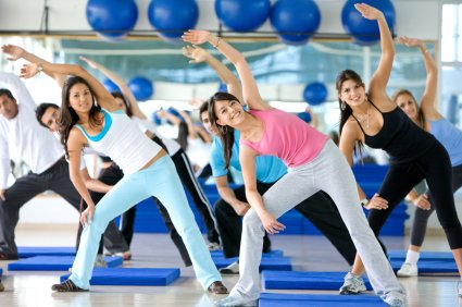 Group of men and women in an aerobics class