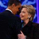 President Obama and Hillary Clinton embrace and smile