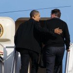 Obama and UK Prime Minister aboarding a plane in conversation