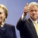 Hillary and Bill Clinton with smiles and Bill's thumbs up