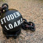 A black ball with black chains that read Student Loans in white letters
