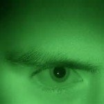 Green image of a closeup of an eye