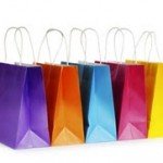 Colorful shopping bags are lined up in a row