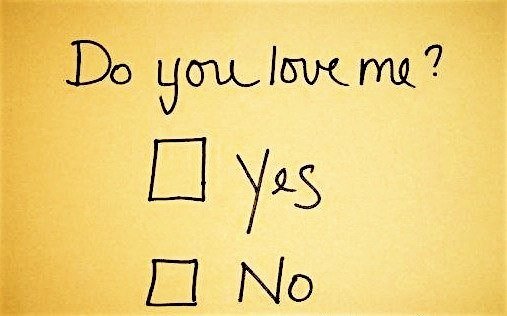 Handwritten letter reading Do you love me? with yes/no checkbox