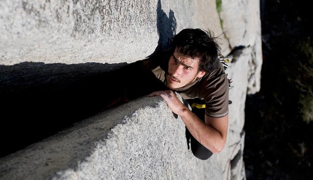 Man stuck in the crevice of two rocks